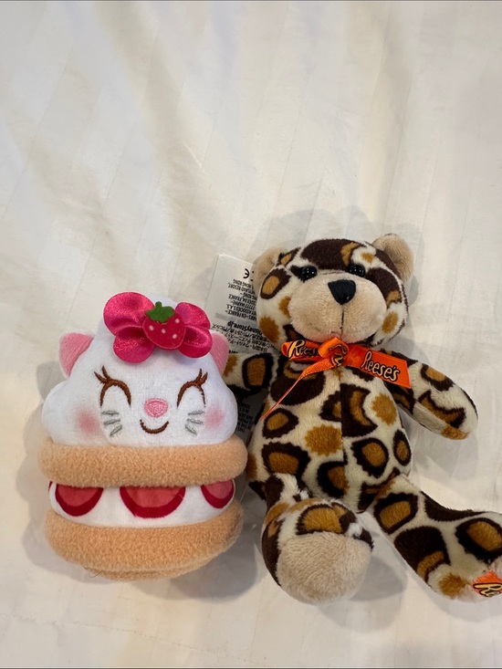 Other - Disney strawberry shortcake, stuffed plushy and Reese’s pieces leopard plushy